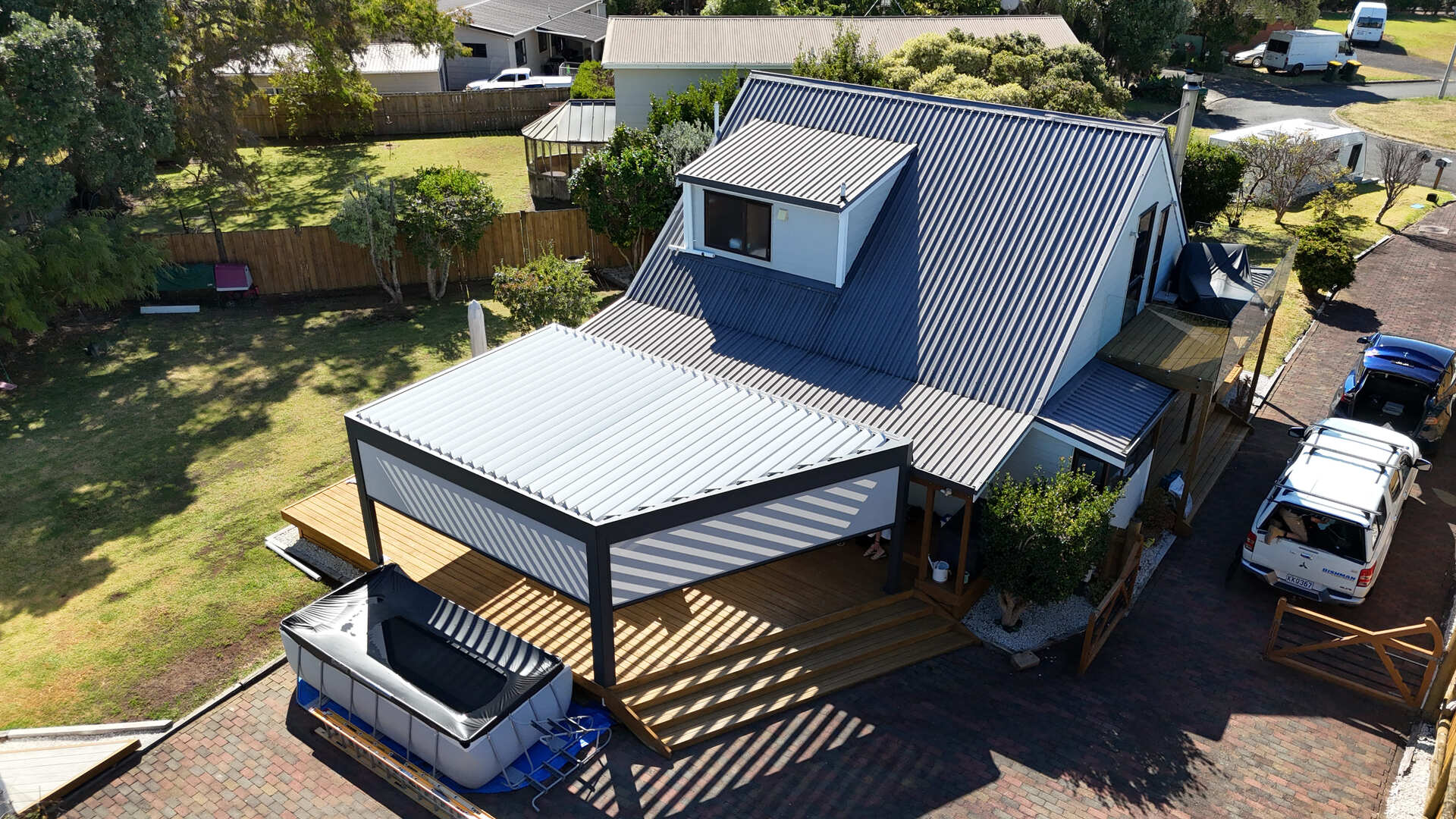 Tika freestanding aluminium louvre pergola on a deck